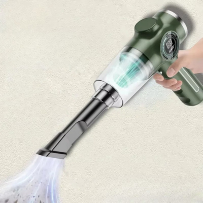 une main droite d une femme maintient aspirateur voiture sans fil