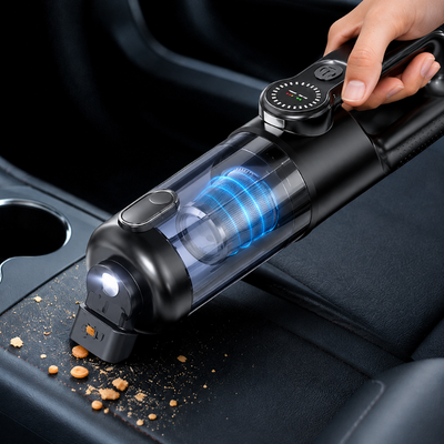 Aspirateur voiture sans fil avec lampe LED aspirant les miettes près de la console