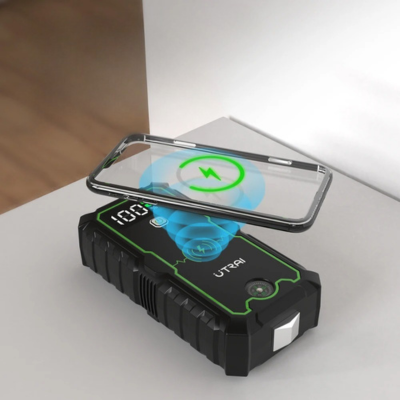 Chargeur batterie de voiture multifonction Démarreur de secours avec fonction chargeur téléphone sans fil, compact et puissant.