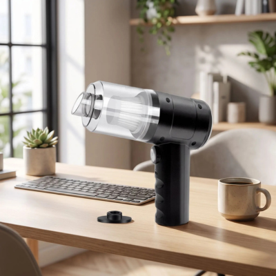 Aspirateur spécial voiture posé sur un bureau, utilisable aussi à la maison