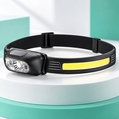 Lampe frontale noire avec éclairage COB et spot latéral