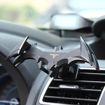 beau support de telephone pour voiture batman noir sur la bouche d aeration de la voiture
